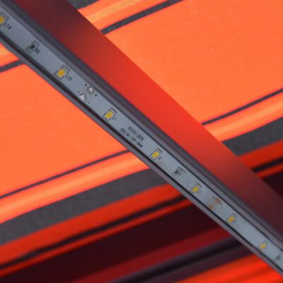 vidaXL Manuell uttrekkbar markise med LED 600x300 cm oransje og brun
